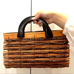 A very interesting wood hand bag. Made from wood sticks.